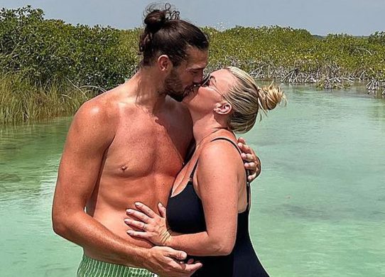 Billi Mucklow kisses Andy Carroll in a black swimsuit on honeymoon